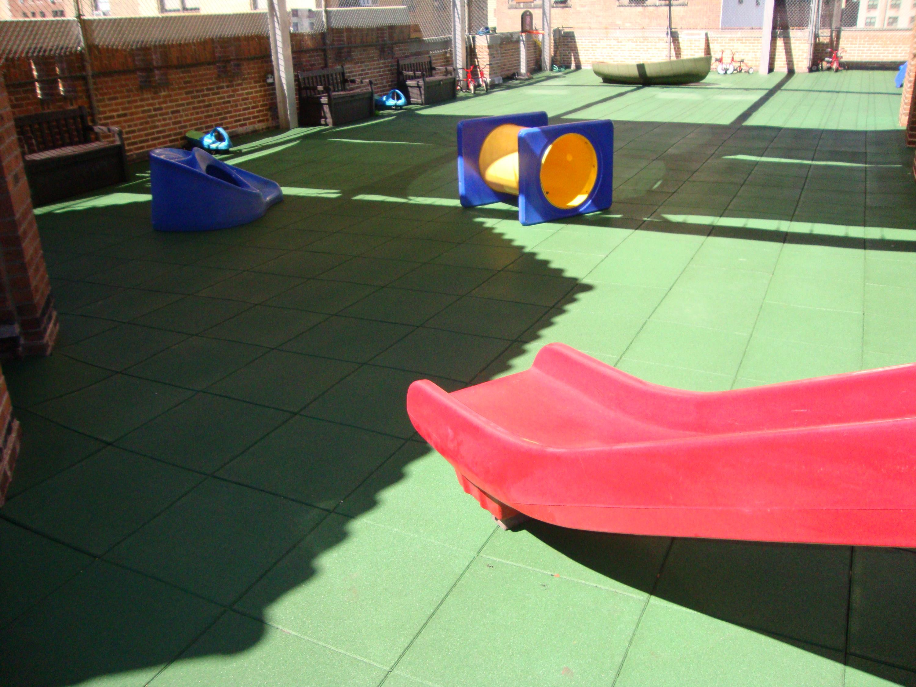 Rooftop Playground in need of a permeable rubber play tile b