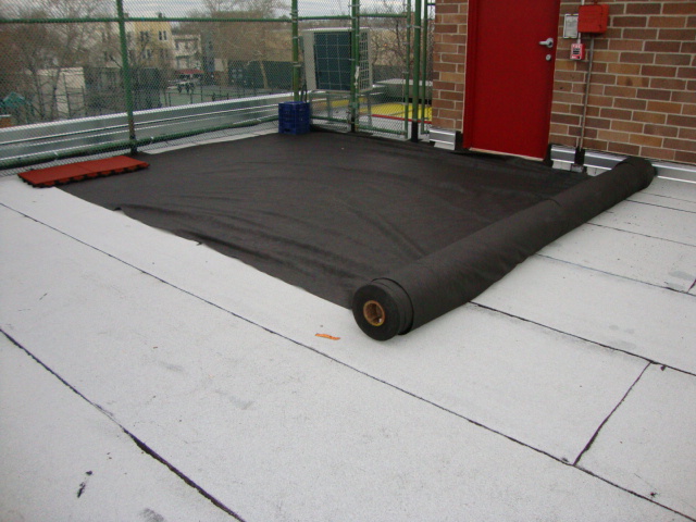 Filter Fabric for rooftop membrane application where rubber pavers will be installed