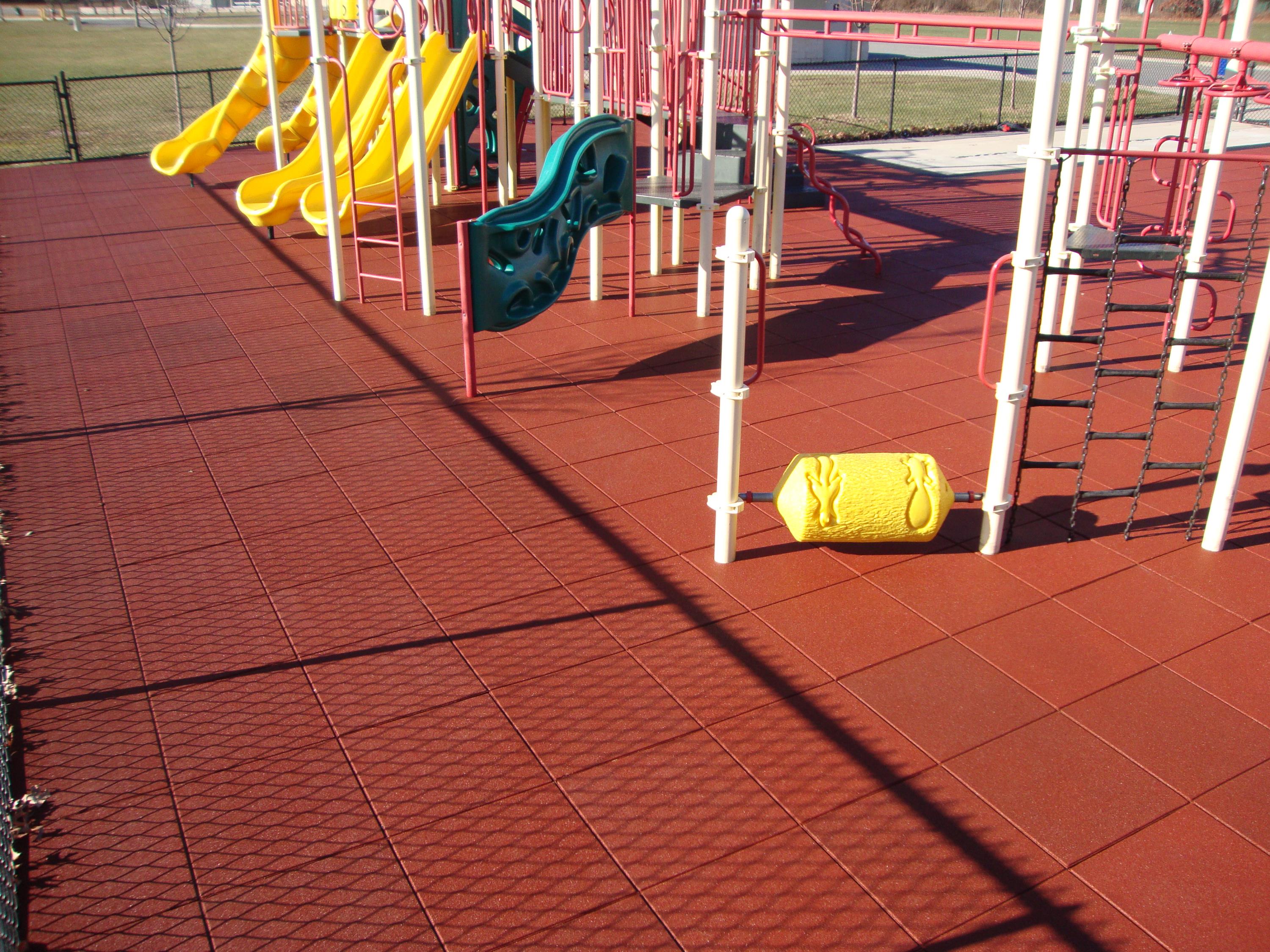 2.5" Pigmented TC-Red Interlocking Rubber Tiles On This Park Playground UNITY'S Play-Land Series on this park playground using 2.5" Pigmented TC-Red