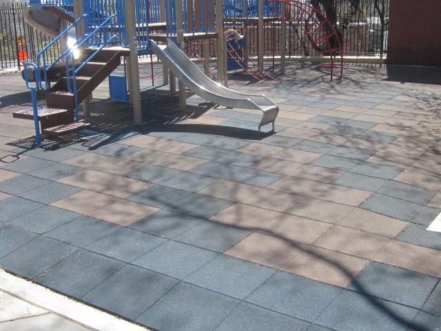 UNITYS Playground Surfacing Showing Bridal Image of Install from 2006 Playground Safety Surfacing Showing no Signs of Separation Curling and or Peeling