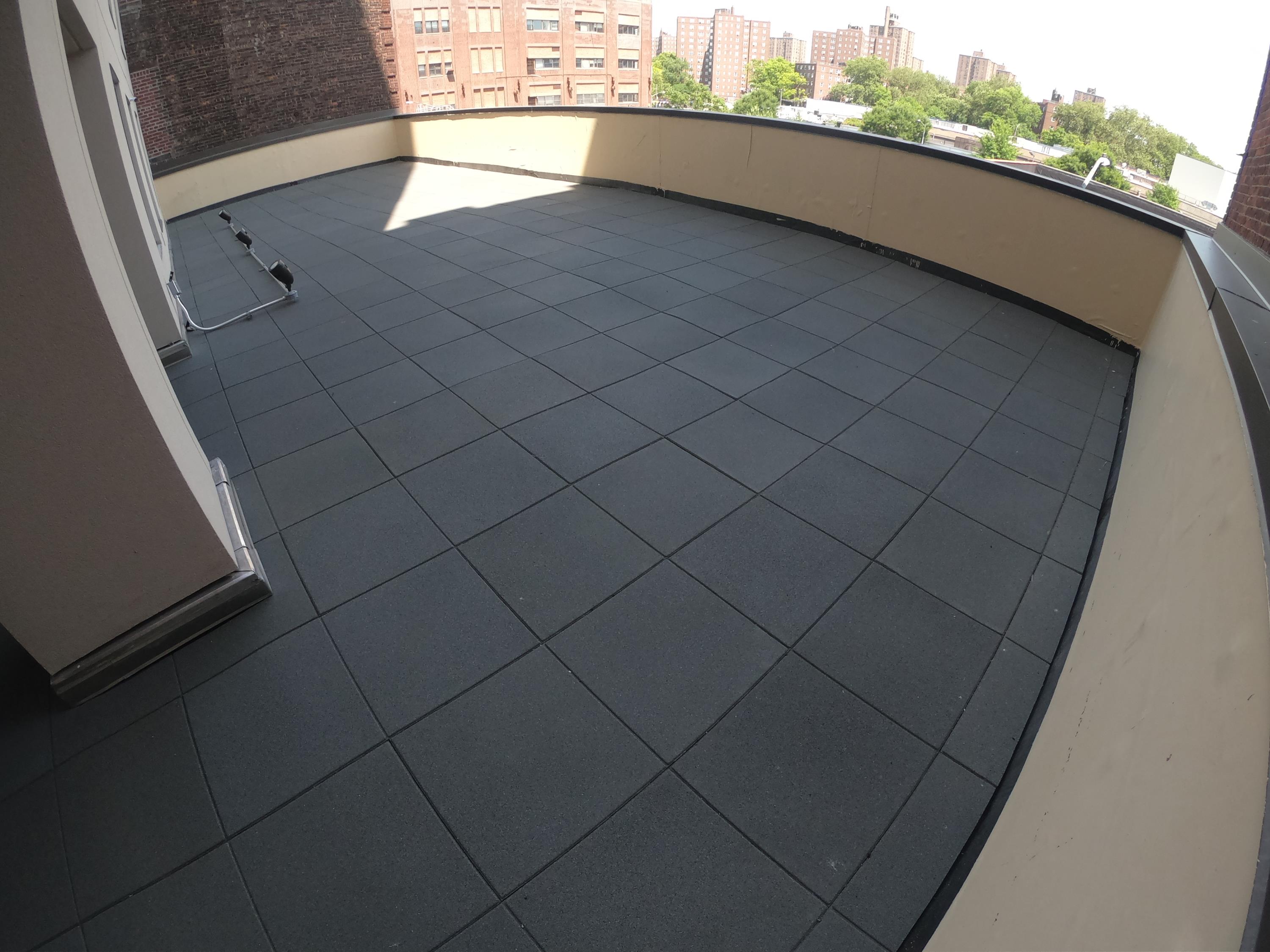 UNITY - Soft rubber pavers installed on this hotel rooftop