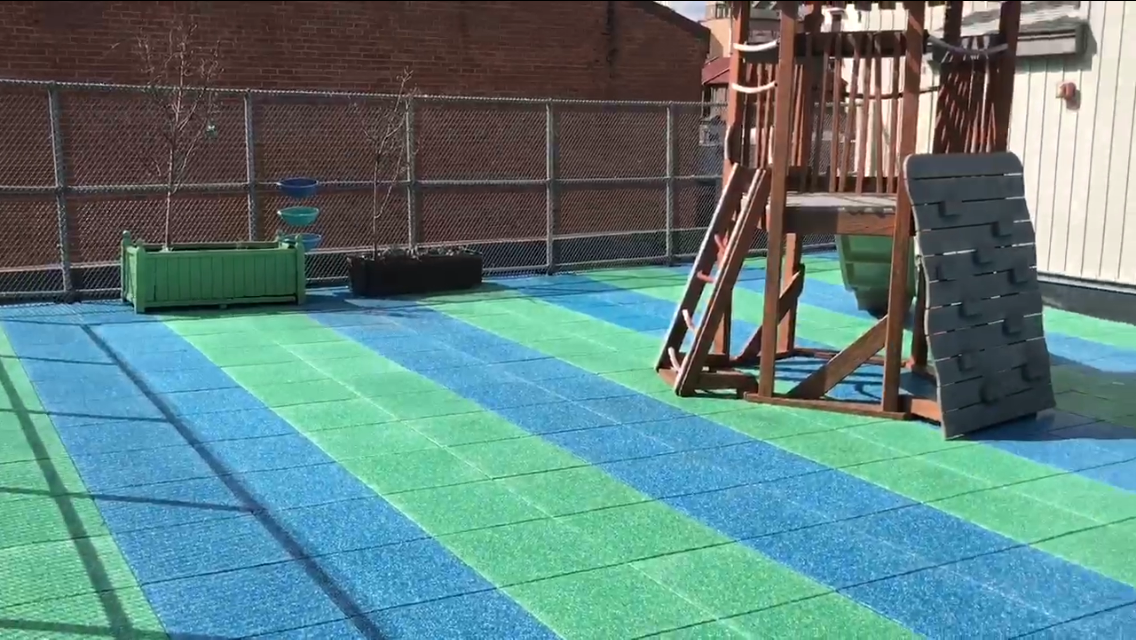 Rooftop playground tiles using Play-Lands 2.5" thick Material Rooftop Playground in Philadelphia using TPV Chips