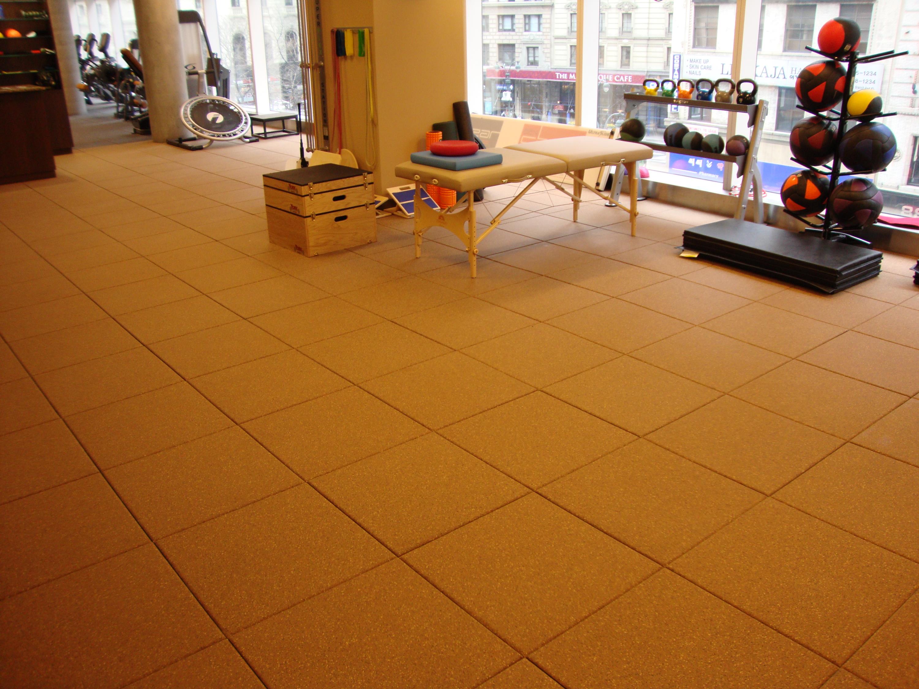 Unity - Indoor Fitness area using 85% Mustard Yellow, 10% Beige, 5% Brown