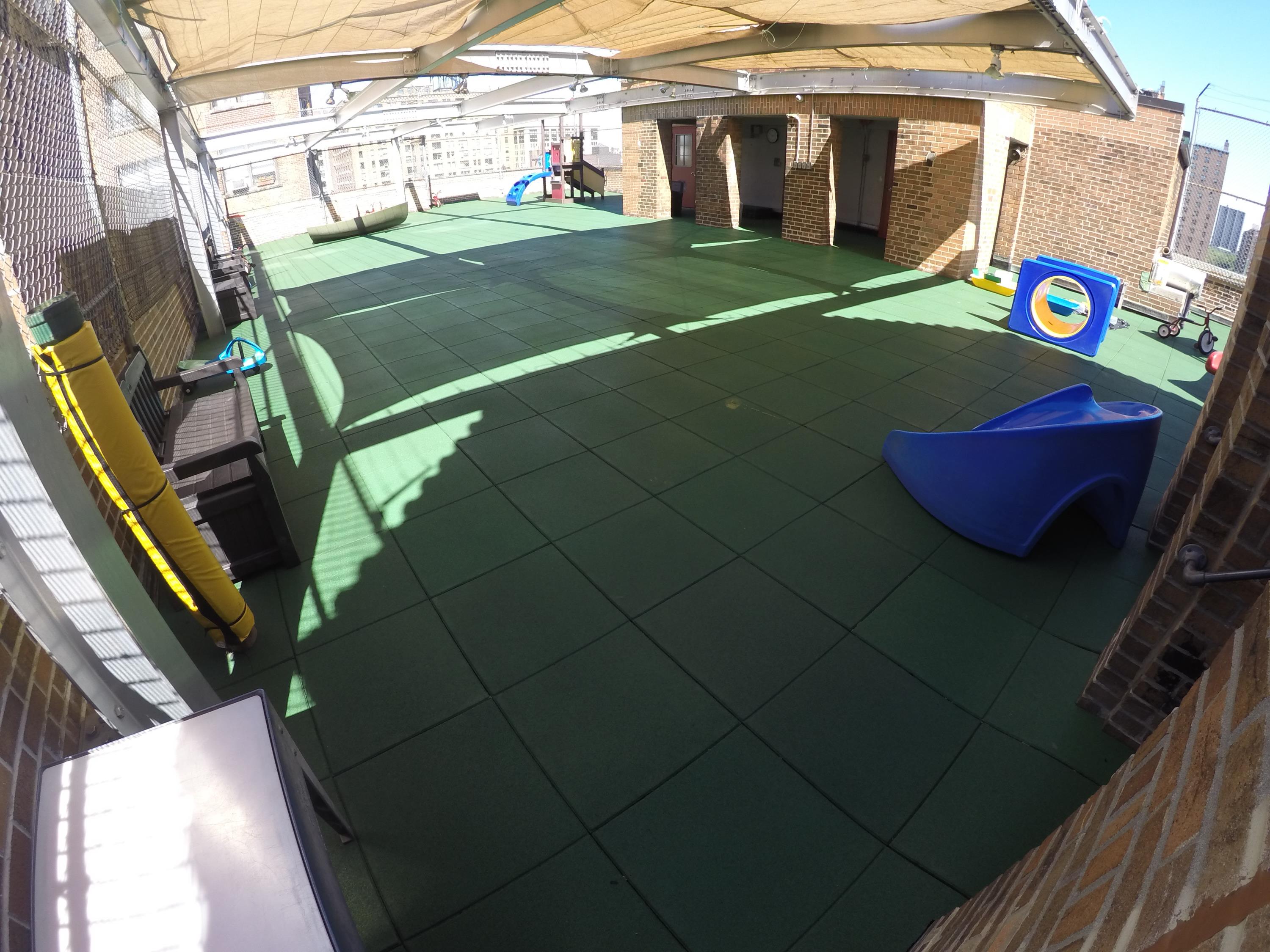 Rooftop Playground in need of a permeable rubber play tile