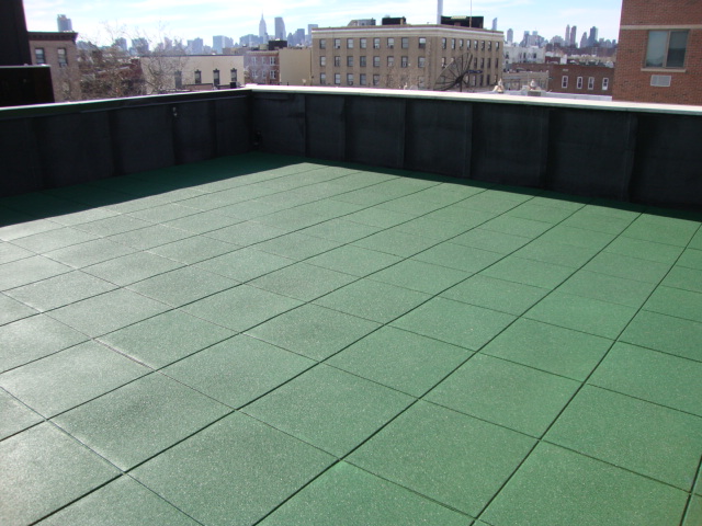 Rooftop Patio Using Pave-Land Series In Pigmented Leaf Green