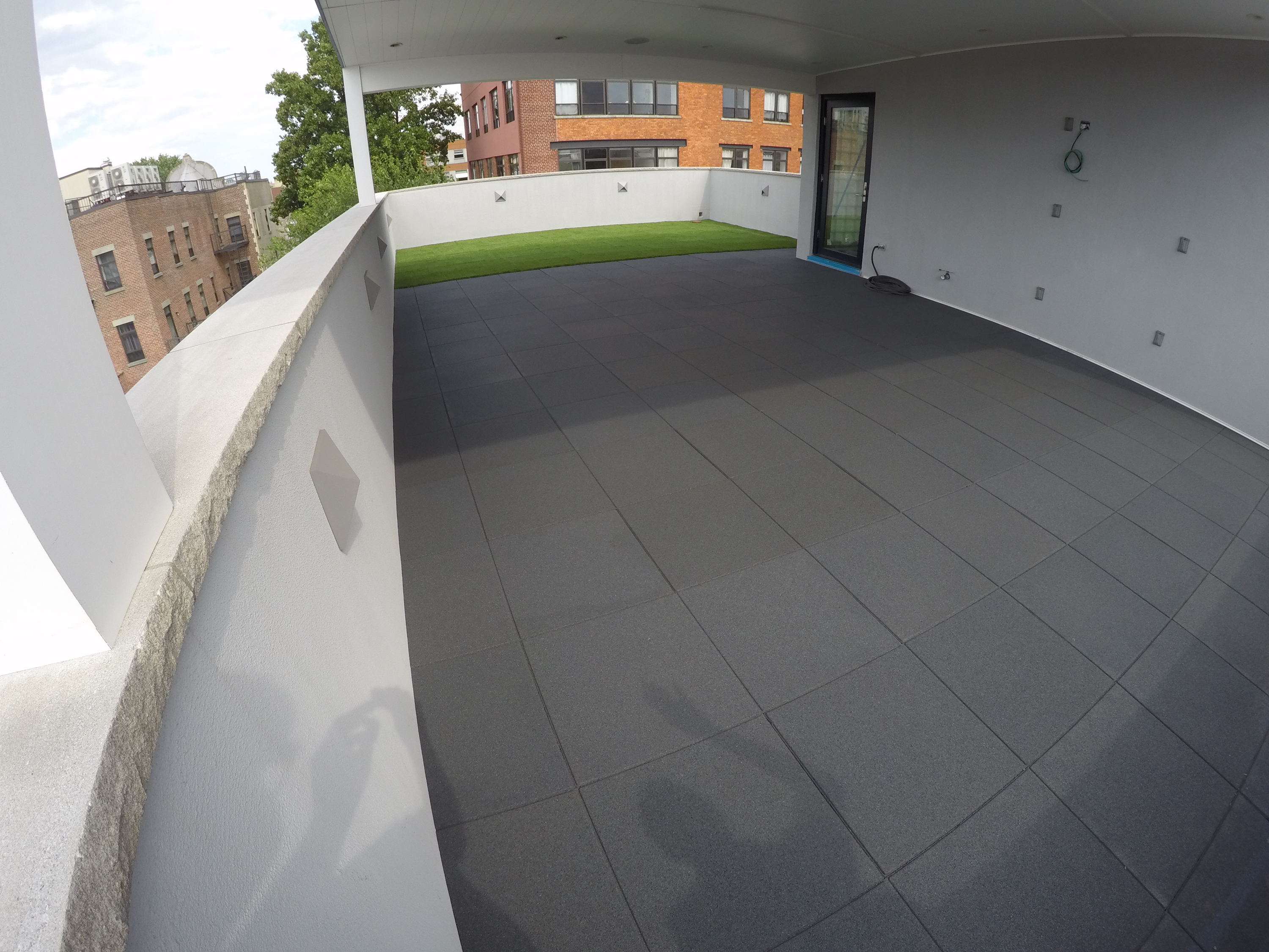 UNITY - Turf Top Tile and our Std Rubber Paver on Rooftop Patio in NYC