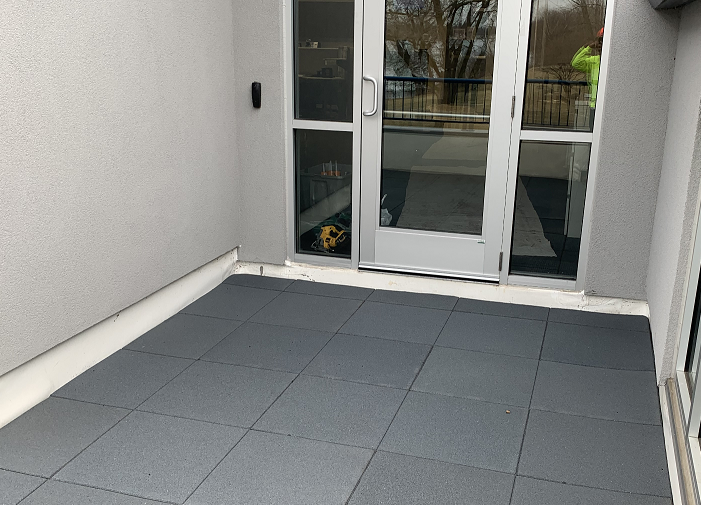 Unity Rubber Pavers on rooftop patio in IN. using 2" Pigmented Grey