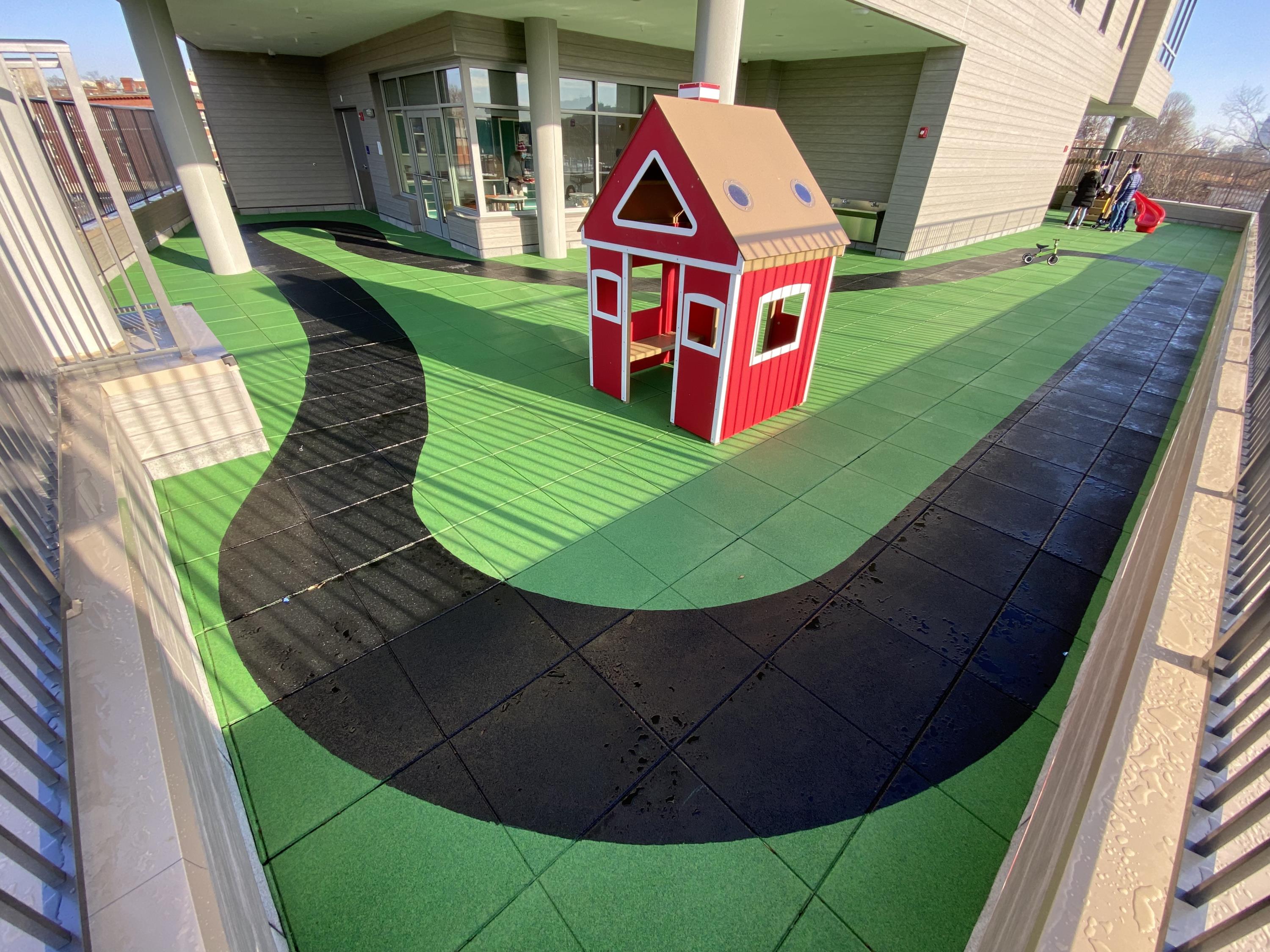 UNITY Rubber Pavers on School Rooftop Playground in Boston w/Painted Track (4)