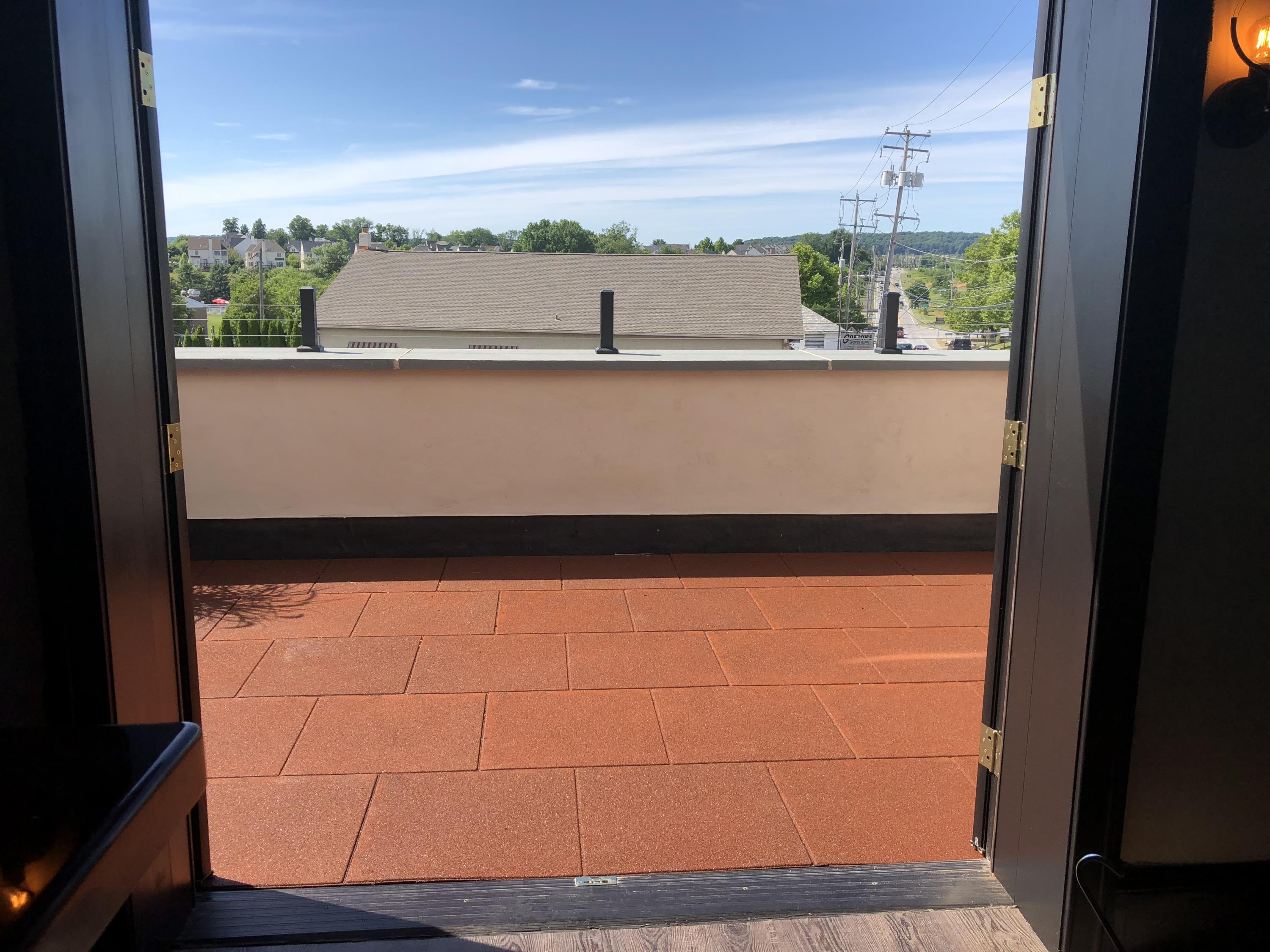 Interlocking Rubber Roof Pavers in the Pigmented Terra Cotta RED