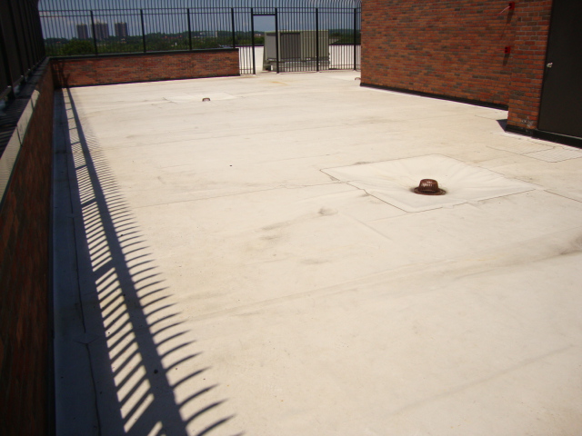 Charter School Rooftop Playground Using Bright Pigmented Colors