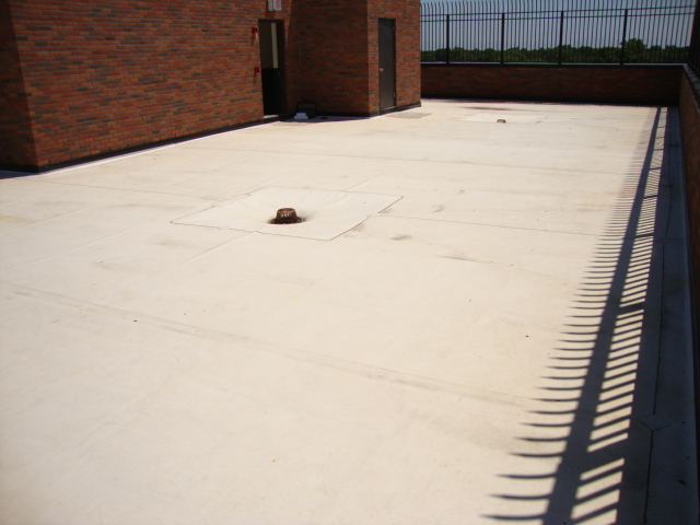 Charter School Rooftop Playground Using Bright Pigmented Colors