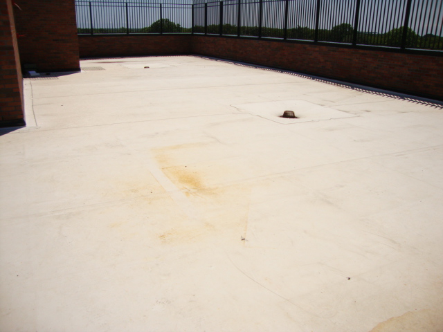 Charter School Rooftop Playground Using Bright Pigmented Colors