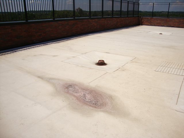 Charter School Rooftop Playground Using Bright Pigmented Colors