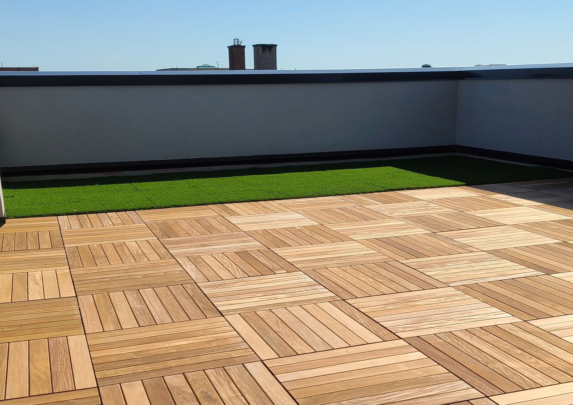 UNITY Turf-Top Tiles sitting flush with other product for smooth transition.