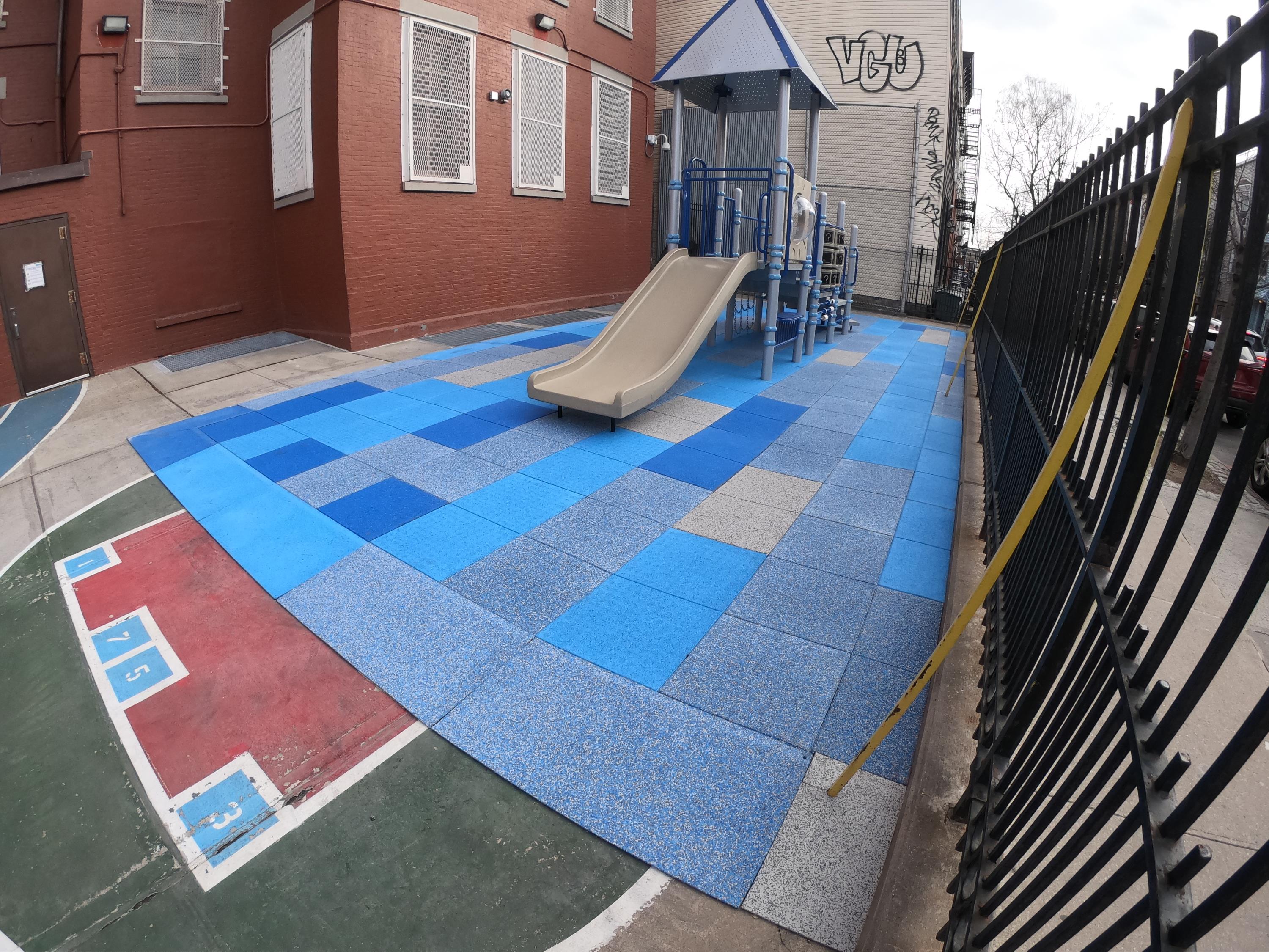 UNITY Surfacing at School using Custom Blended TPV Top Tiles