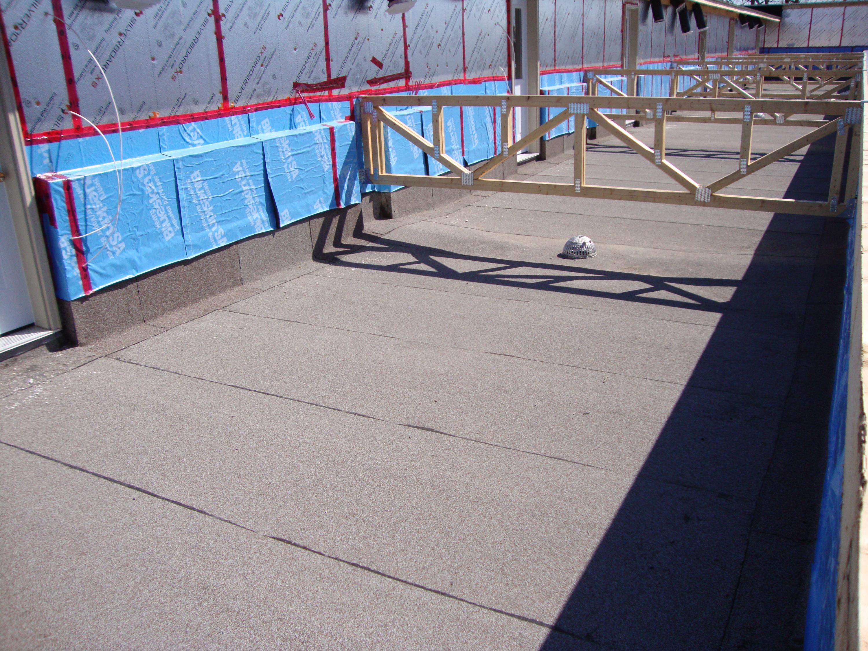 Apt Complex in CANADA Using Gray Rubber Pavers c