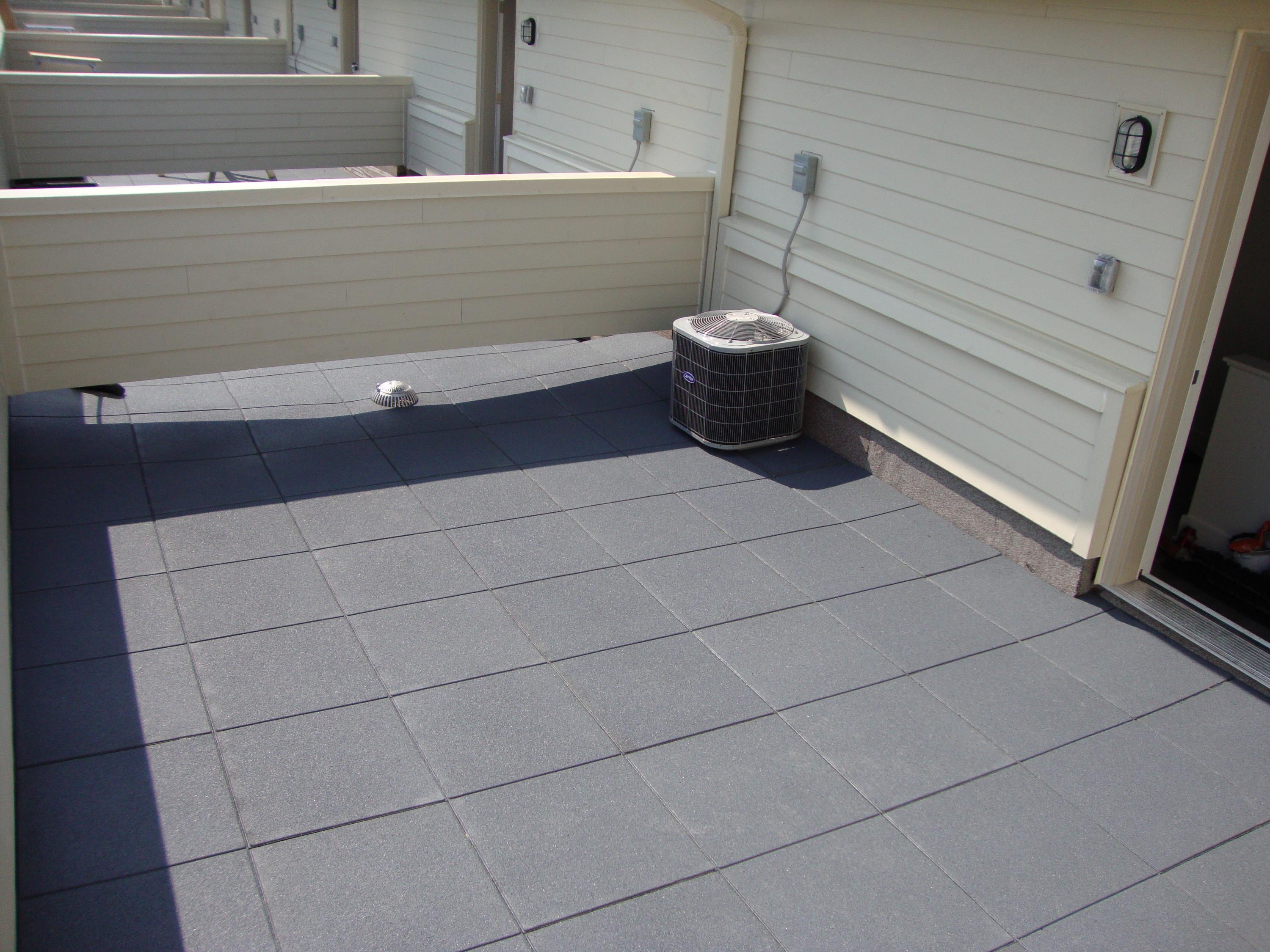 Apt Complex in CANADA Using Gray Rubber Pavers d