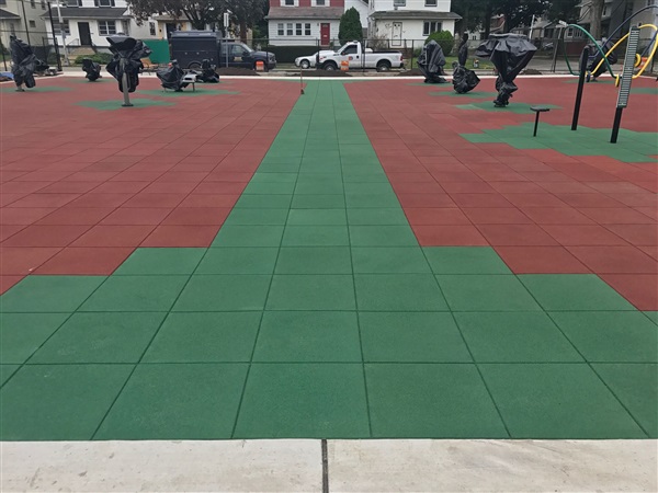 Unity on Muni Park Outdoor Fitness area using Pigmented Interlocking Tiles D