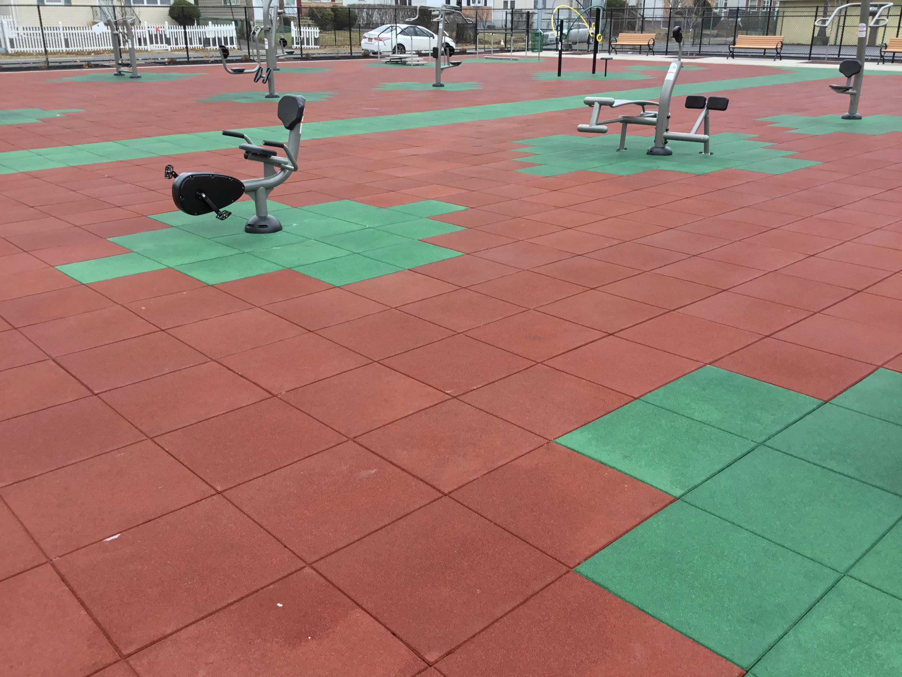 Unity on Muni Park Outdoor Fitness area using Pigmented Interlocking Tiles F