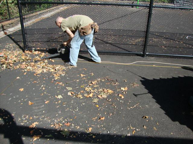 Cleaning the sub-base material before our finished products are installed